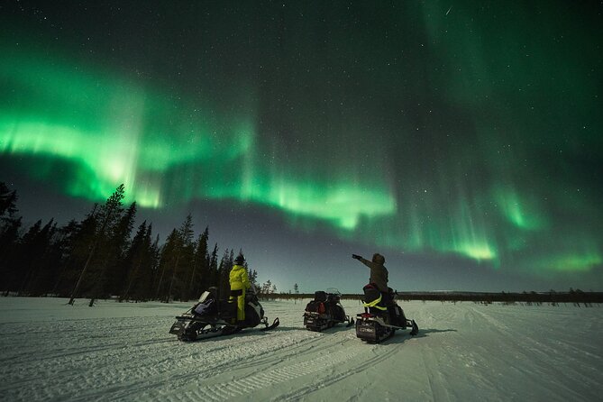 3 Hours Snowmobiling under Auroras and Night Sky - The campfire stop in a Sami-style tipi