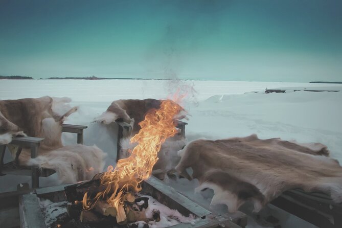Arctic Darkness & Starlight Adventure with Snowshoes - The campfire pause and hot chocolate