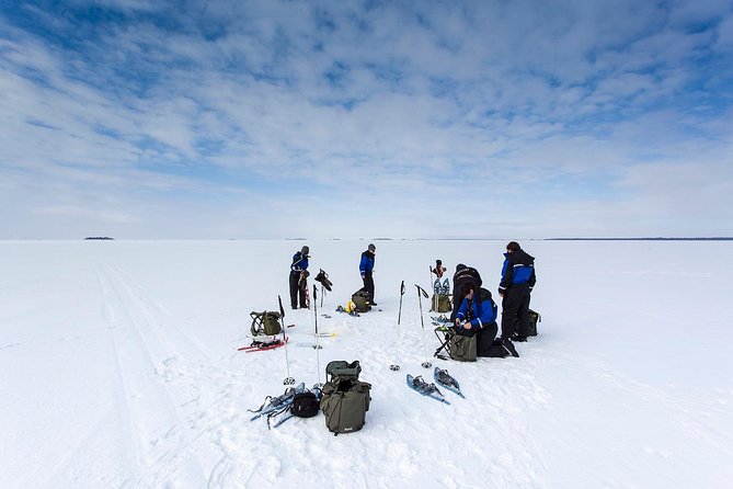 Arctic Day with Ice Fishing and Floating - Ice fishing gives the day its local flavor