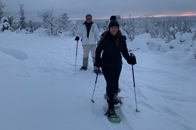 Arctic Reindeer Farm Experience with Snowshoeing in the Wild - Snowshoeing across the frozen lake