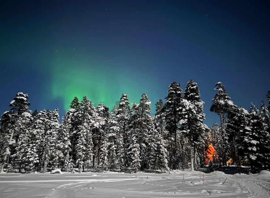 Arctic Tent Sauna Experience with Ice Swimming - Taking the ice swim one careful step at a time