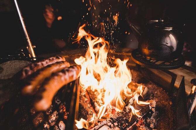 Aurora Arctic Ice Floating in Rovaniemi, Small-group - Fire, cookies, and the heated wooden cabin