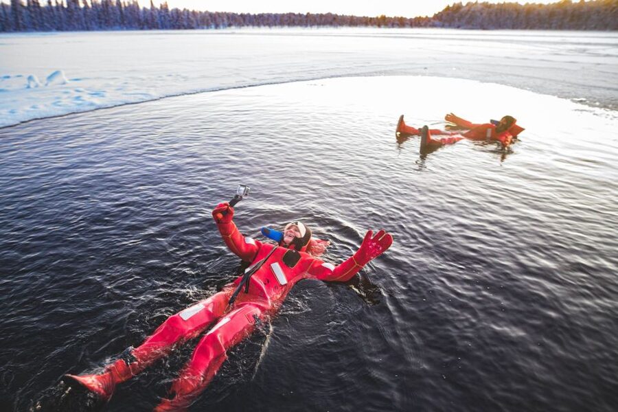 Daytime Ice Floating Rovaniemi, Frozen Lake Experience - The cottage, fire, hot drinks, and cookies