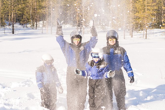 Family Snowmobile Safari from Santa Claus Village - A Finnish campfire with sausages and berry juice