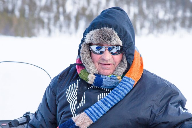From Ivalo: Ice Fishing Safari to Lake Inari, reindeers & lunch - Who will enjoy this Ivalo outing