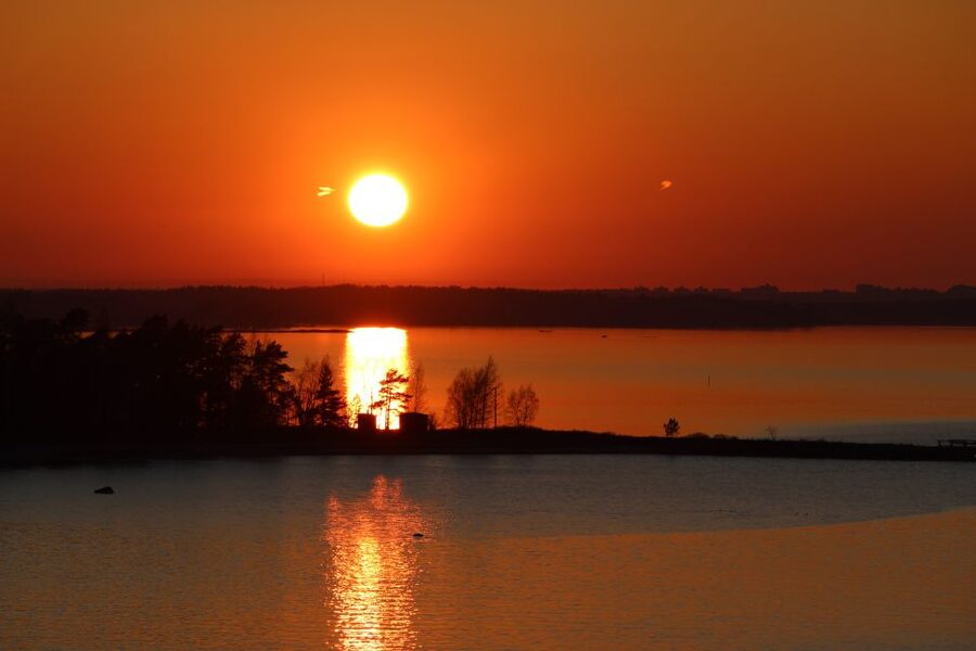 From Rovaniemi: Midnight Sun Forest Lake Float - Why floating under the midnight sun feels so unusual