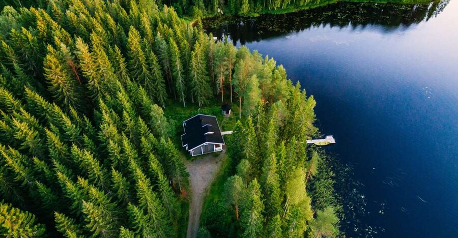 From Rovaniemi: Midnight Sun Forest Lake Float - From your Rovaniemi hotel to the forest
