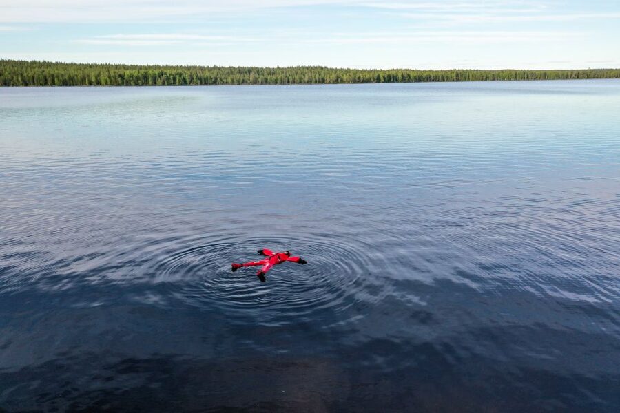 From Rovaniemi: Midnight Sun Forest Lake Float - What guides Gigi and Chris add