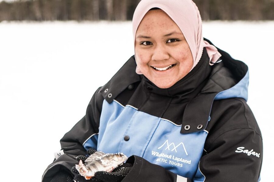 From Rovaniemi: Snowshoeing and Ice Fishing Tour - Making your own hole for ice fishing