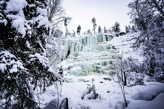 Frozen Waterfalls of Korouoma Canyon tour with Pro Photos & BBQ - Getting fitted for Arctic hiking