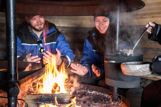 Full Day Snowmobile Safari into the Lappish Wilderness in Rovaniemi - Campfire lunch and a proper Arctic pause