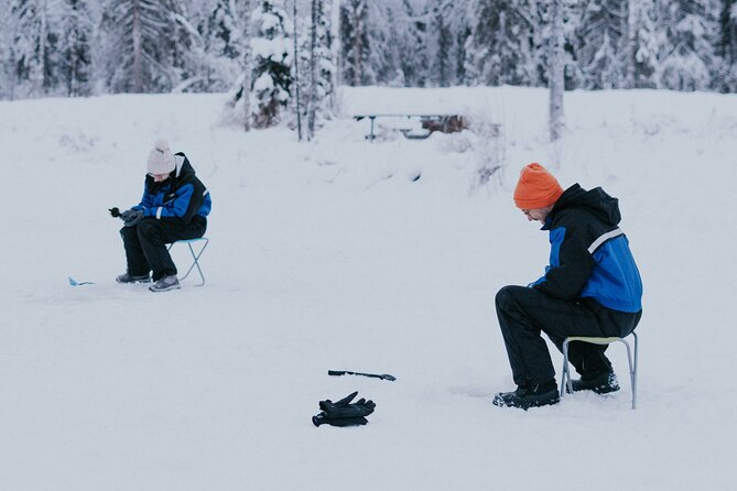 Ice Fishing by Snowmobile in Levi - Crossing the frozen lake to the fishing spot