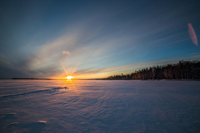 Ice Fishing on a Frozen Lake in Levi - Meeting Beyond Arctic in central Levi