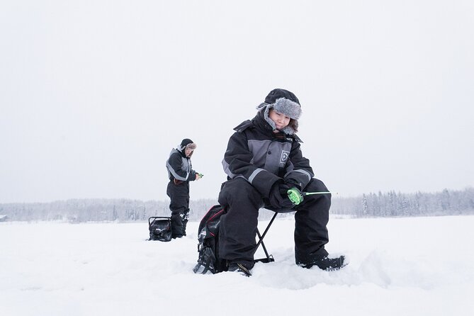 Ice Fishing on a Frozen Lake in Levi - Drilling your own fishing hole