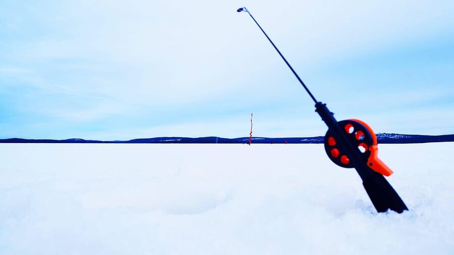 Ice fishing program in Lapland - Good for families, groups, and patient beginners