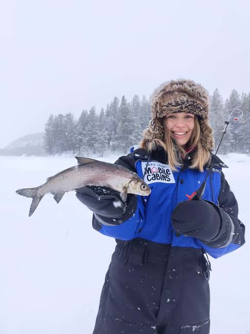 Inari: 2 hour Ice Fishing at Lake Inari - A comfortable ride by sledge across Lake Inari