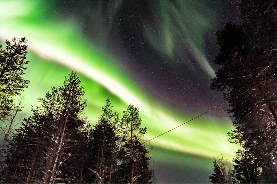 Inari: Northern Lights Hunt Snowmobile Safari - Leaving Inari for the dark Arctic night