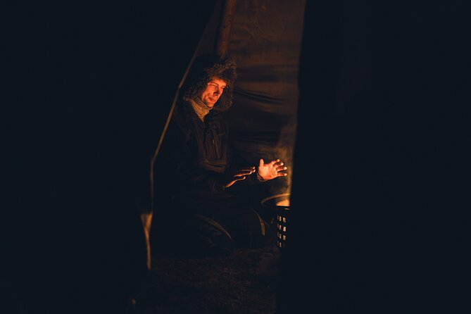 Ivalo: Aurora Hunting with Reindeer - Reindeer sausages, hot berry juice, and a fire-lit hut