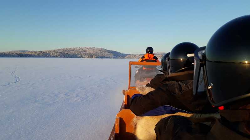 Ivalo: Ice Fishing Tour to Lake Inari, Reindeers & Lunch - A snowmobile sleigh ride across the frozen north