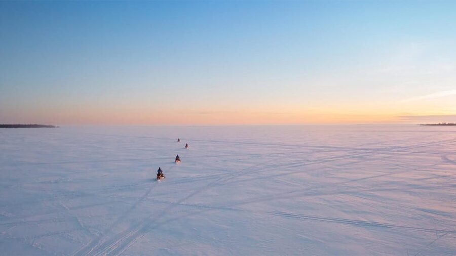 Kemi-Tornio: Ice Fishing Safari with Snowmobiles - Sharing a snowmobile and taking turns