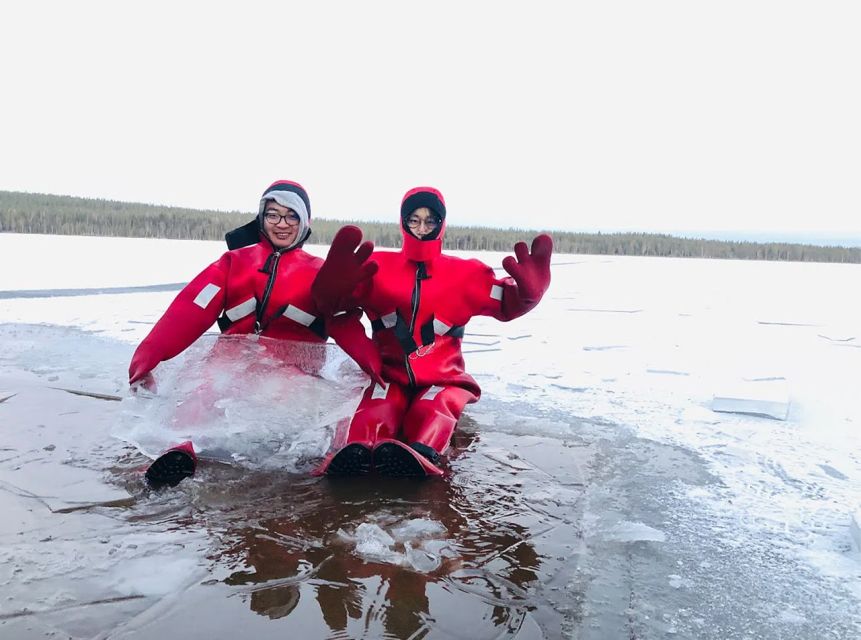 Lapland: Ice Fishing, Floating & BBQ Snow Adventure - Learning to fish through solid ice