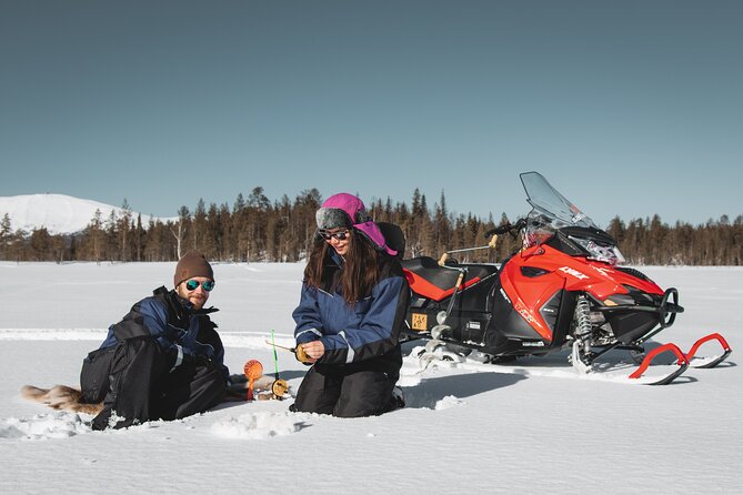Lappish Lunch Break -Snowmobiling, ice fishing and tasty food - Riding through forests, fields, and frozen rivers