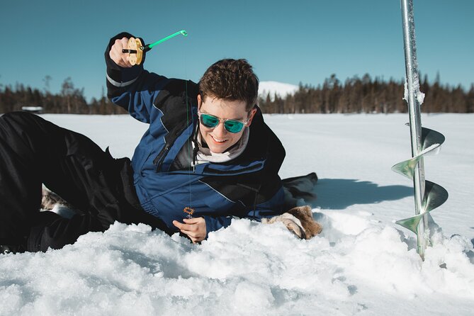 Lappish Lunch Break -Snowmobiling, ice fishing and tasty food - Learning Finnish ice fishing at a quiet hole