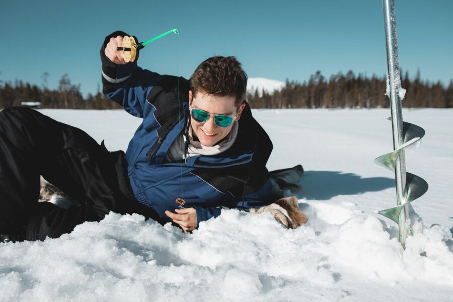 Levi: Finnish Ice Fishing Tour by Car - Getting dressed for Finnish winter
