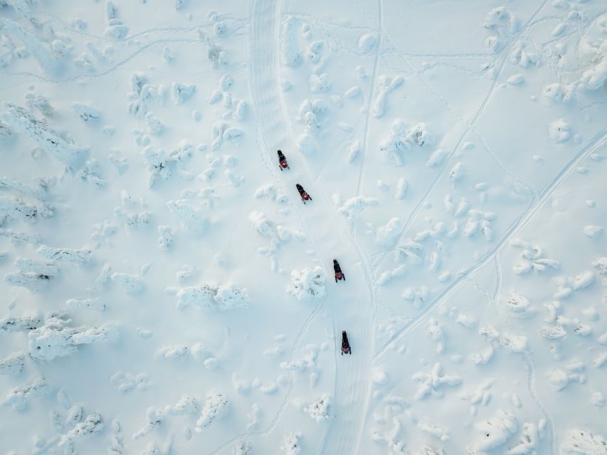 Levi: Snowmobile Safari with Ice Fishing and Outdoor Lunch - What sharing a snowmobile really means
