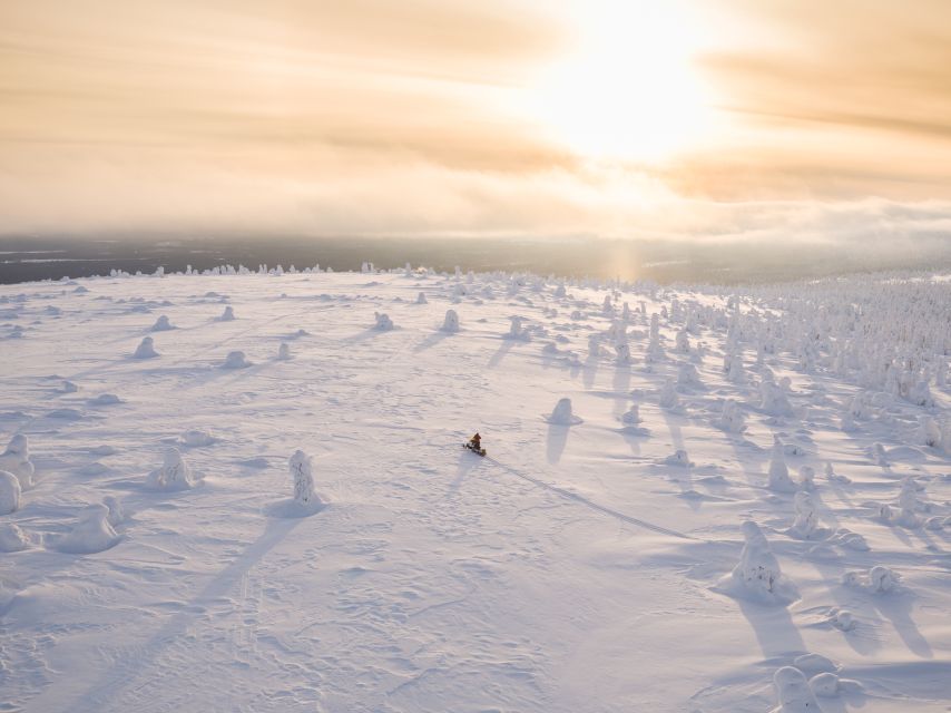 Levi: Snowmobiling Adventure - Getting suited up at Levintie 1585