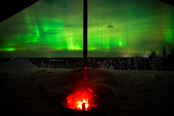 Night Snowshoeing Adventure under the Northern Lights - Getting fitted for snowshoes in Rovaniemi