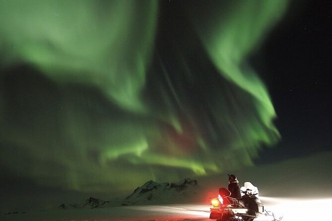 Northern Lights Snowmobile Hunt - Riding into the Finnish night