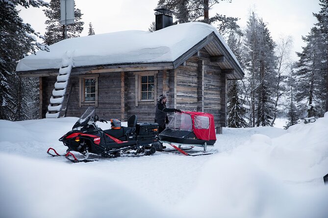 Northern Lights Snowmobile Sledge Ride in Rovaniemi - Through the snowy forest by sledge