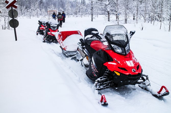 Northern Lights Snowmobile Sleigh Ride - Sitting back while the guide drives