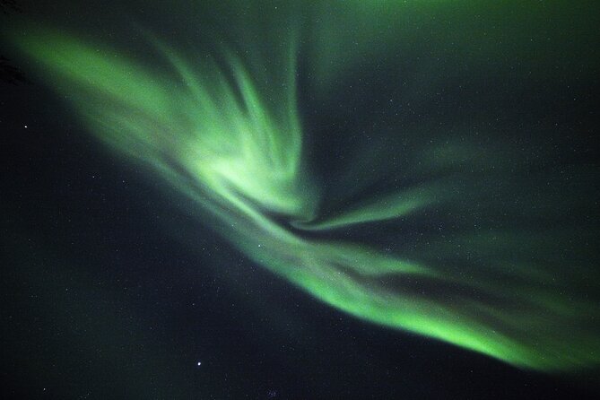 Private Group: Northern Lights Hunt 4x4 SUV with Aurora guarantee - The kota, campfire, and frozen river