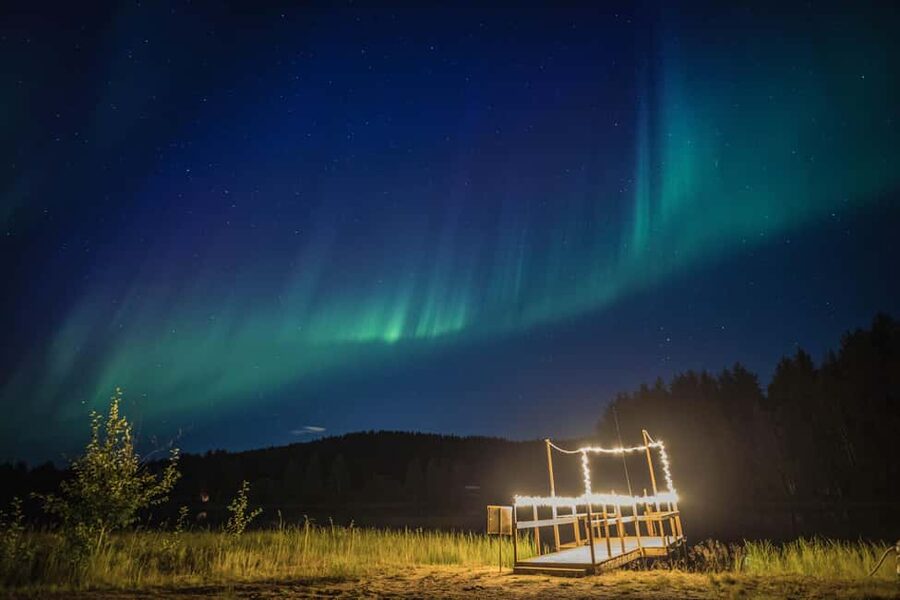 Rovaniemi: Arctic Ice Floating and Northern Lights Tour - Getting ready for the thermal suit