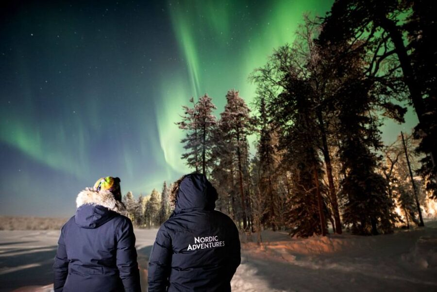 Rovaniemi: Arctic Ice Floating and Northern Lights Tour - Entering the frozen lake