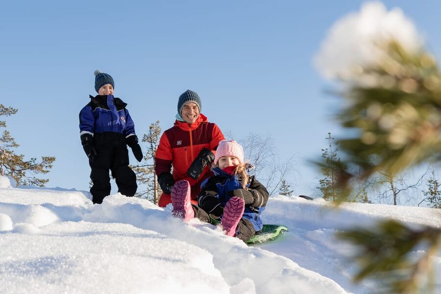 Rovaniemi: Family Snowmobile Trip with Guide and Picnic - Riding through the snowy wilderness