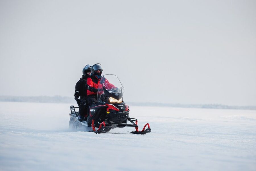 Rovaniemi: Ice Fishing & Snowmobile Safari Combo Day - Getting dressed for four hours in the cold