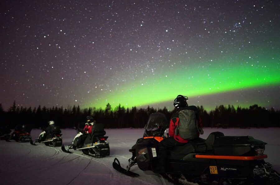 Rovaniemi: Northern Lights Snowmobile Hunt - Children ride under different rules