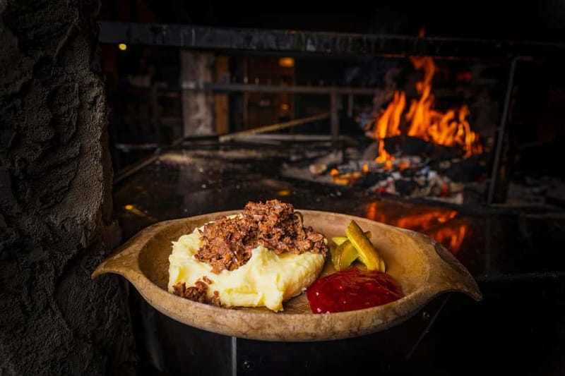 Rovaniemi: Snow Sauna Experience, Jacuzzi and Dinner in Kota - Dinner in Kota Restaurant, with reindeer or salmon