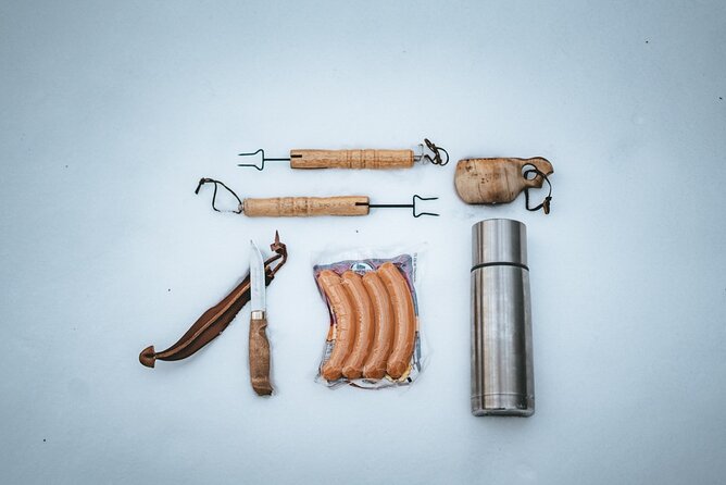 Rovaniemi: Snowshoeing in a magical snowy forest - The fire, sausages, and hot juice