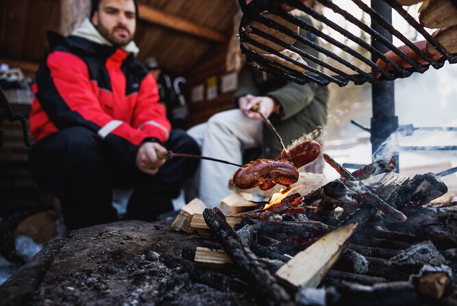 Rovaniemi - Visit to The Frozen Waterfalls of Korouoma - A campfire BBQ in the snowy forest