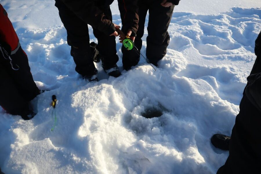 Ruka: Ice fishing trip - Drilling your hole and trying for local fish