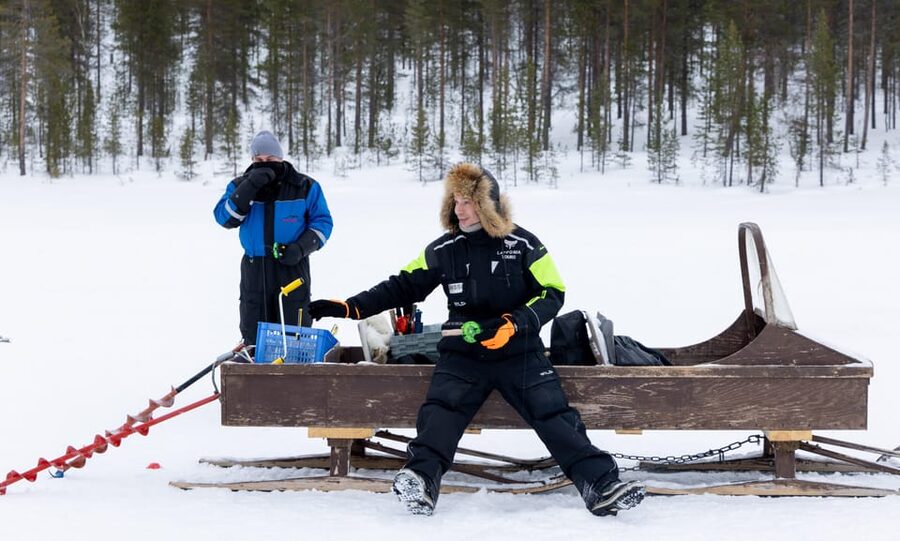Saariselkä: Ice Fishing Safari by Snowmobile - Snowmobile through forests and open fells