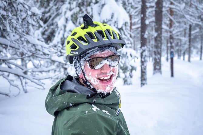 Scenic electric fat bike group ride in Rovaniemi - Across the Kemijoki to the Lumberjack’s Candle Bridge
