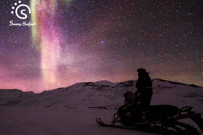 Searching Aurora with Snowmobile - Riding into the dark Arctic forest