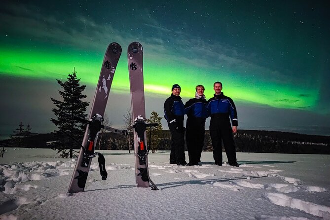 Ski Trekking under the Northern Lights - The campfire pause in the middle