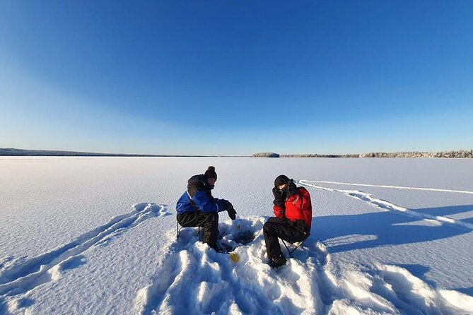 Snowmobile and Ice Fishing Experience - Getting dressed for Finnish winter