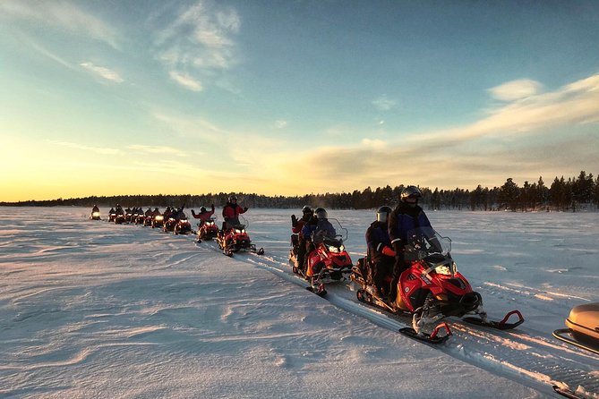 Snowmobile Safari 2h - Crossing the river and entering the forest